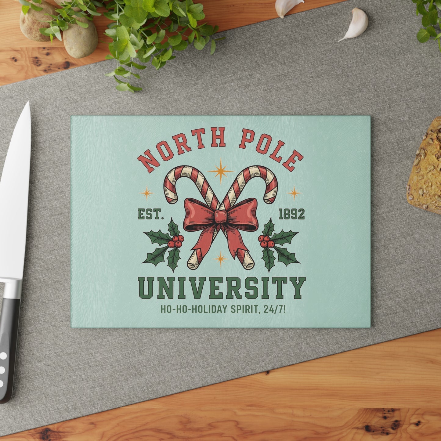 North Pole University Holiday Glass Cutting Board
